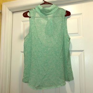 High neck sea foam green blouse tank w/ tie back.